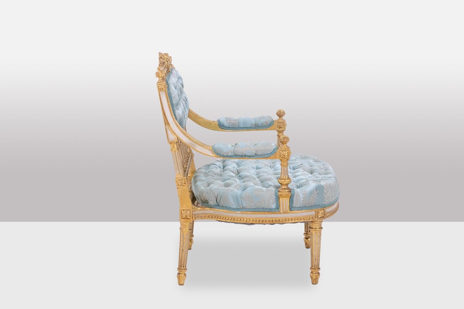 French Louis XVI style fireside chair in gilded and lacquered wood. Circa 1880. For Sale