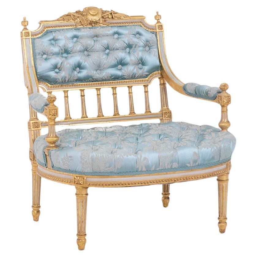 Louis XVI style fireside chair in gilded and lacquered wood. Circa 1880. For Sale