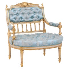 Antique Louis XVI style fireside chair in gilded and lacquered wood. Circa 1880.