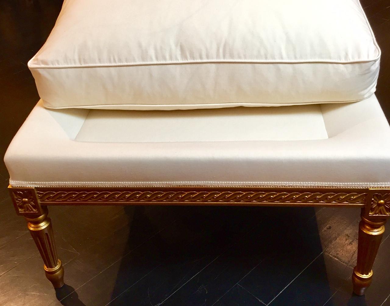 white and gold footstool