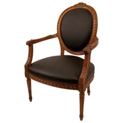 Louis XVI Style French Walnut Armchair with Black Leather Upholstery