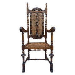 Fauteuil français de style Louis XVI en noyer sculpté avec assise en roseau