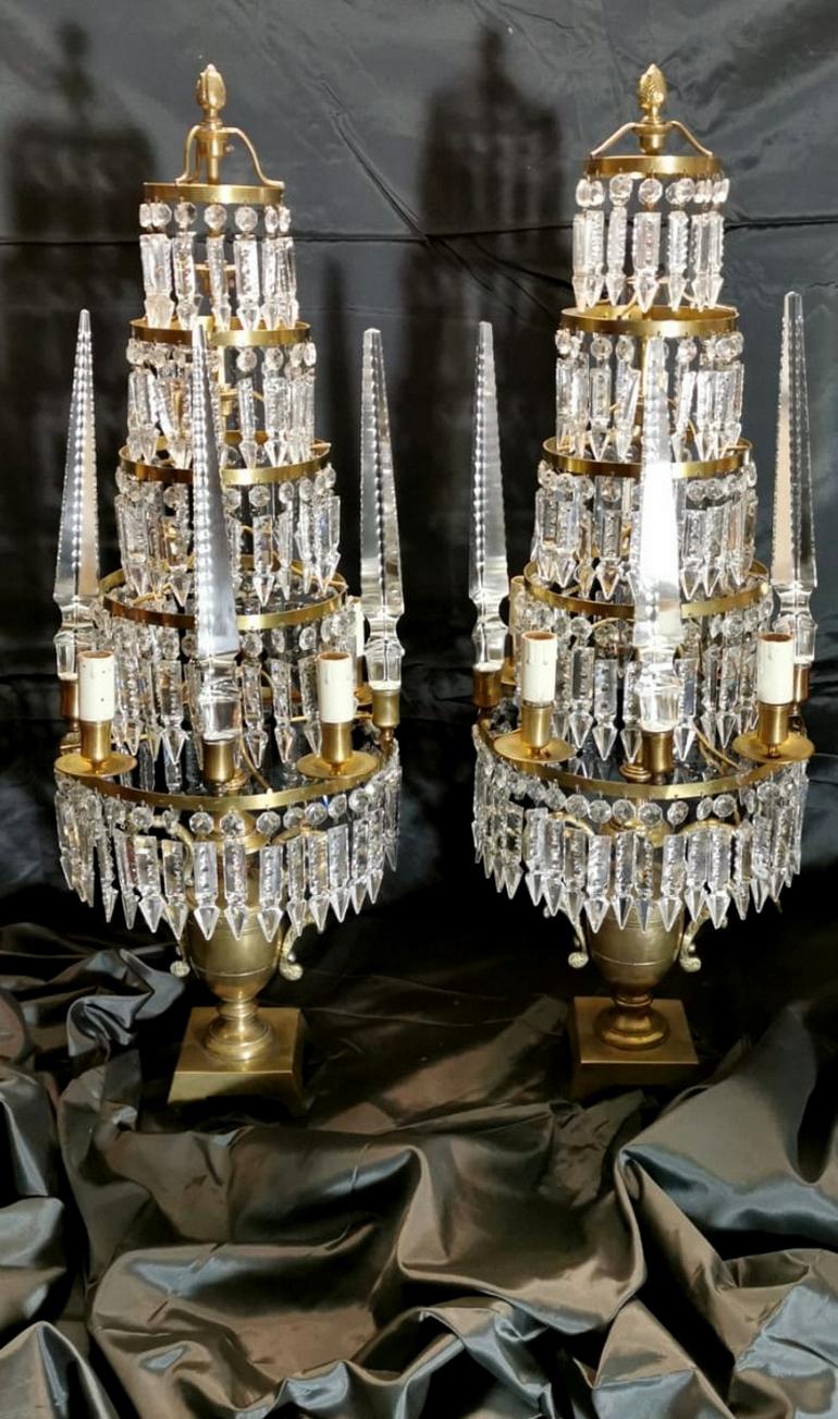 We kindly suggest you read the whole description, because with it we try to give you detailed technical and historical information to guarantee the authenticity of our objects.
Monumental pair of lead crystal girandoles with bronze structure (it was