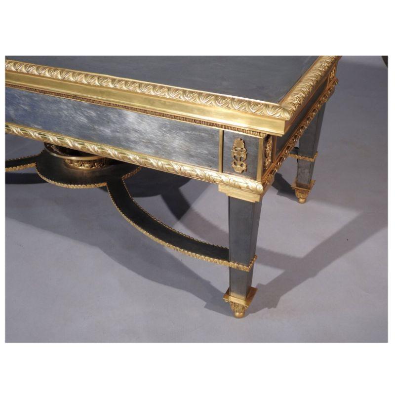 Louis XVI style French ormolu-mounted steel coffee low table

Probably designed by John Vesey or Maison Jansen.

This simply stunning Hollywood Regency coffee table leaves no stone Un-turned as its sleek and timeless design represent this highly
