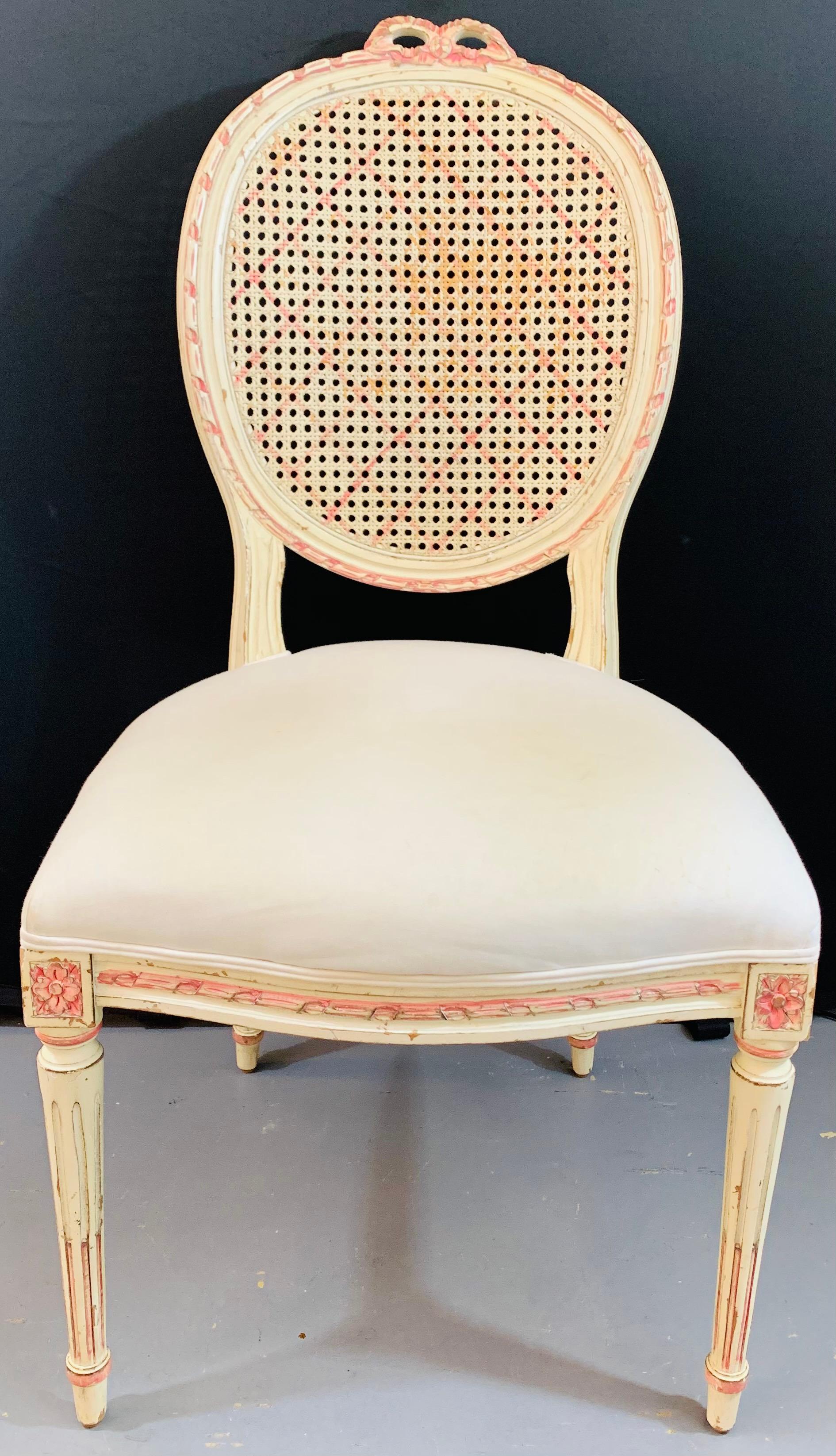 A beautiful Louis XVI style French Provincial ladies' chair. The chair is handprinted in an antiqued white and nicely decorated with pink. Prefect chair to use as desk chair, side or vanity desk chair as well or in any area. 

Dimensions: 20