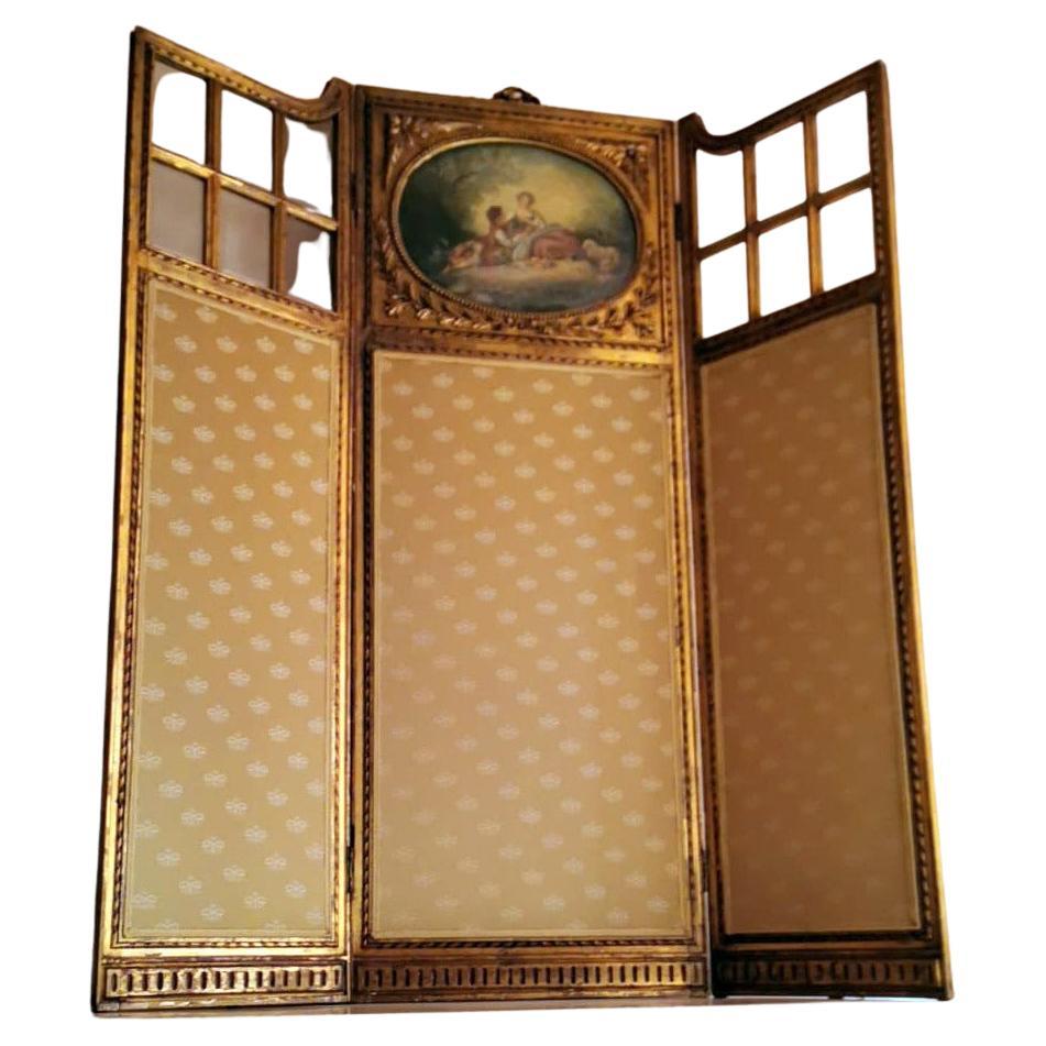 We kindly suggest you read the whole description, because with it we try to give you detailed technical and historical information to guarantee the authenticity of our objects.
Superb French screen with three panels in wood gilded with gold leaf,