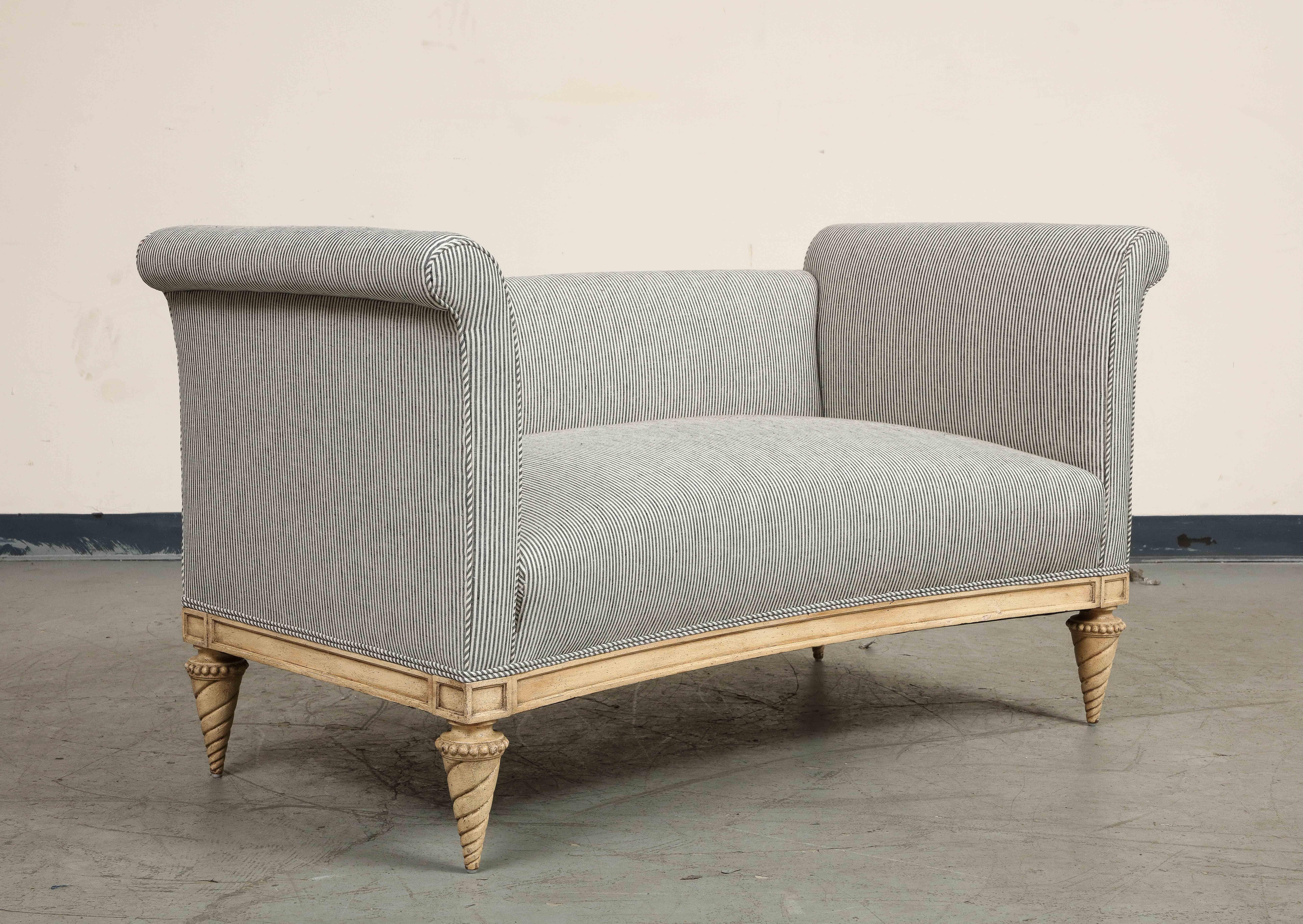Midcentury Louis XVI style French settee in the manner of Maison Jansen, circa 1940. Elegant profile with rolled arms, carved conical feet, and fully welted new upholstery. 

Fully restored and recovered in Schumacher Wesley Ticking Stripe fabric in
