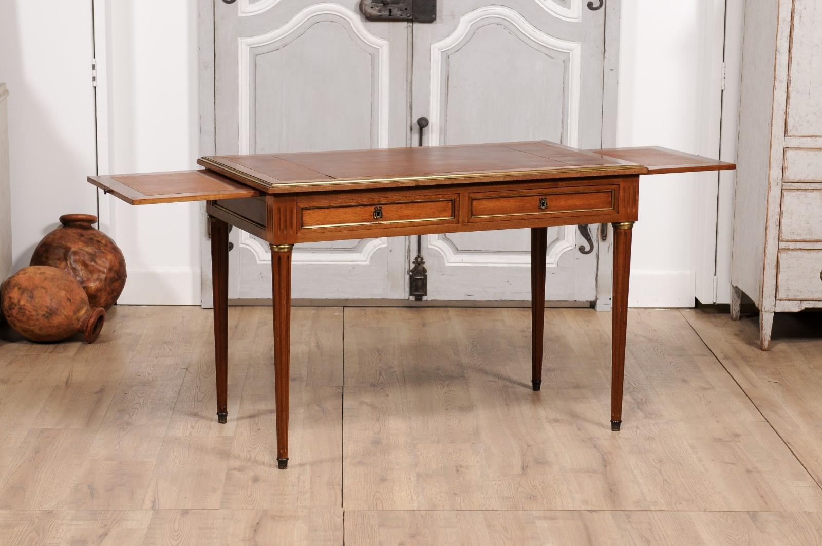 20th Century Louis XVI Style French Walnut Desk with Leather Top and Carved Fluted Legs