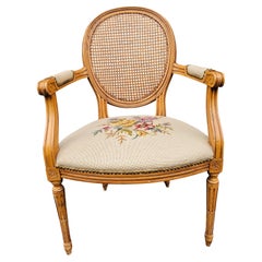 Louis XVI Style Fruitwood, Needlepoint Upholstered Seat And Caned Back Fauteuil