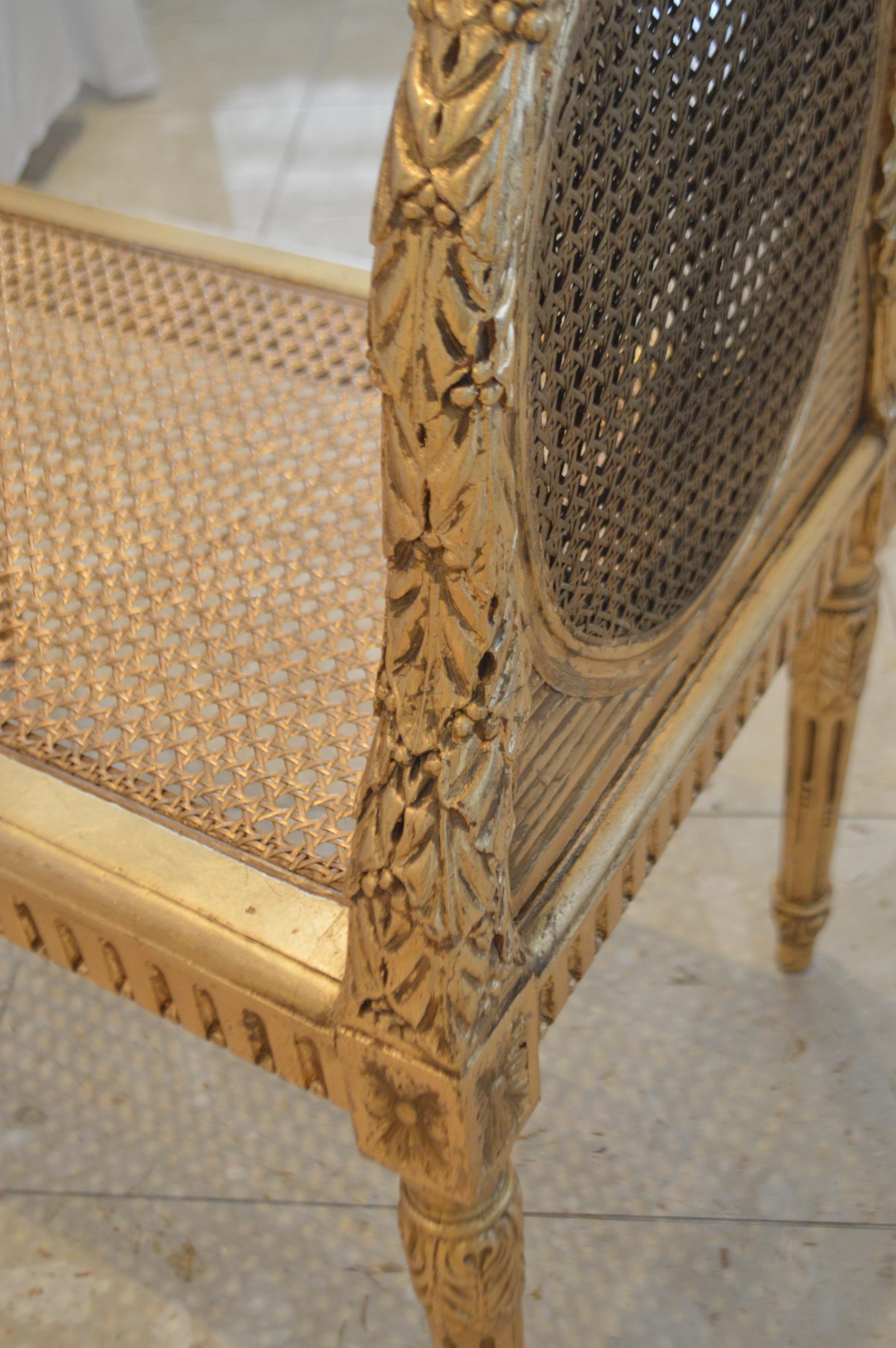 Louis XVI style gilded cane bench, France circa 1900. In Good Condition In Oakville, ON