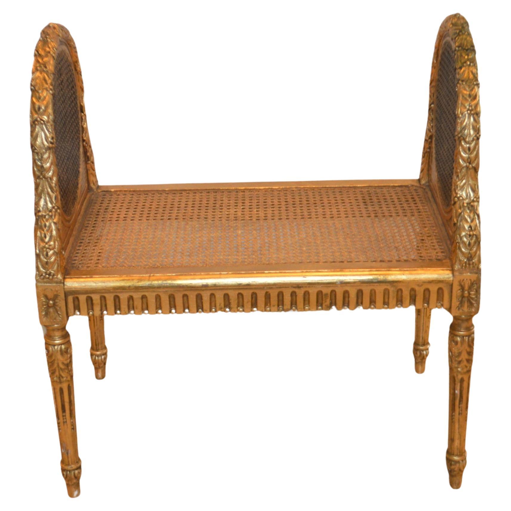 Louis XVI style gilded cane bench, France circa 1900.