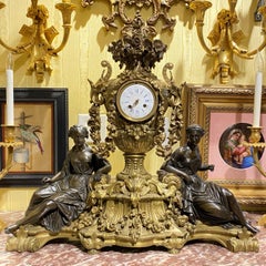 Louis XVI Style Gilt and Patinated Figural Bronze Clock