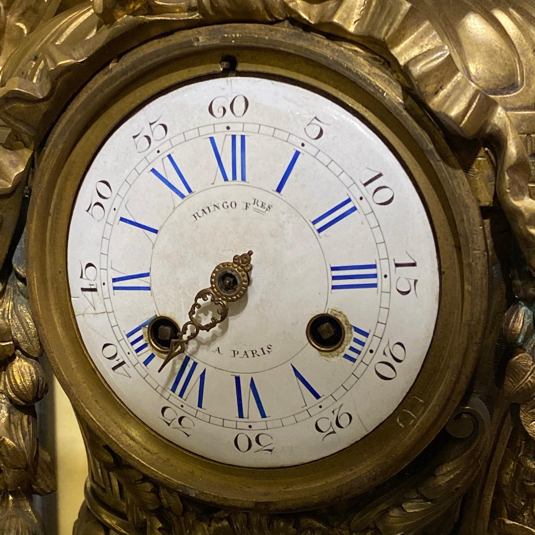 French Louis XVI Style Gilt and Patinated Figural Bronze Clock