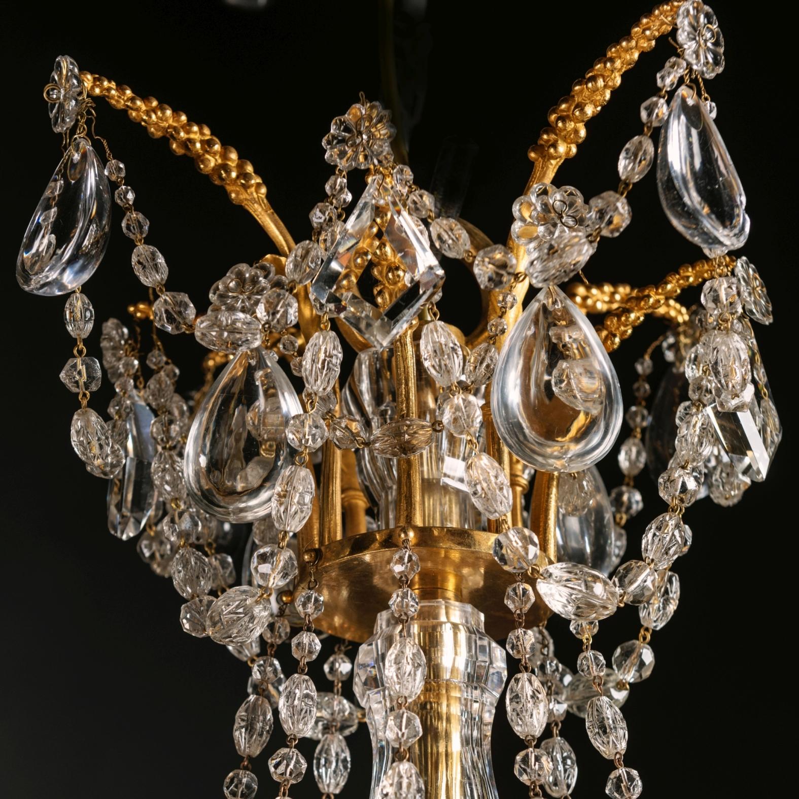 Louis XVI Style Gilt-Bronze and Cut-Glass Eight-Light Chandelier In Good Condition For Sale In Brighton, West Sussex