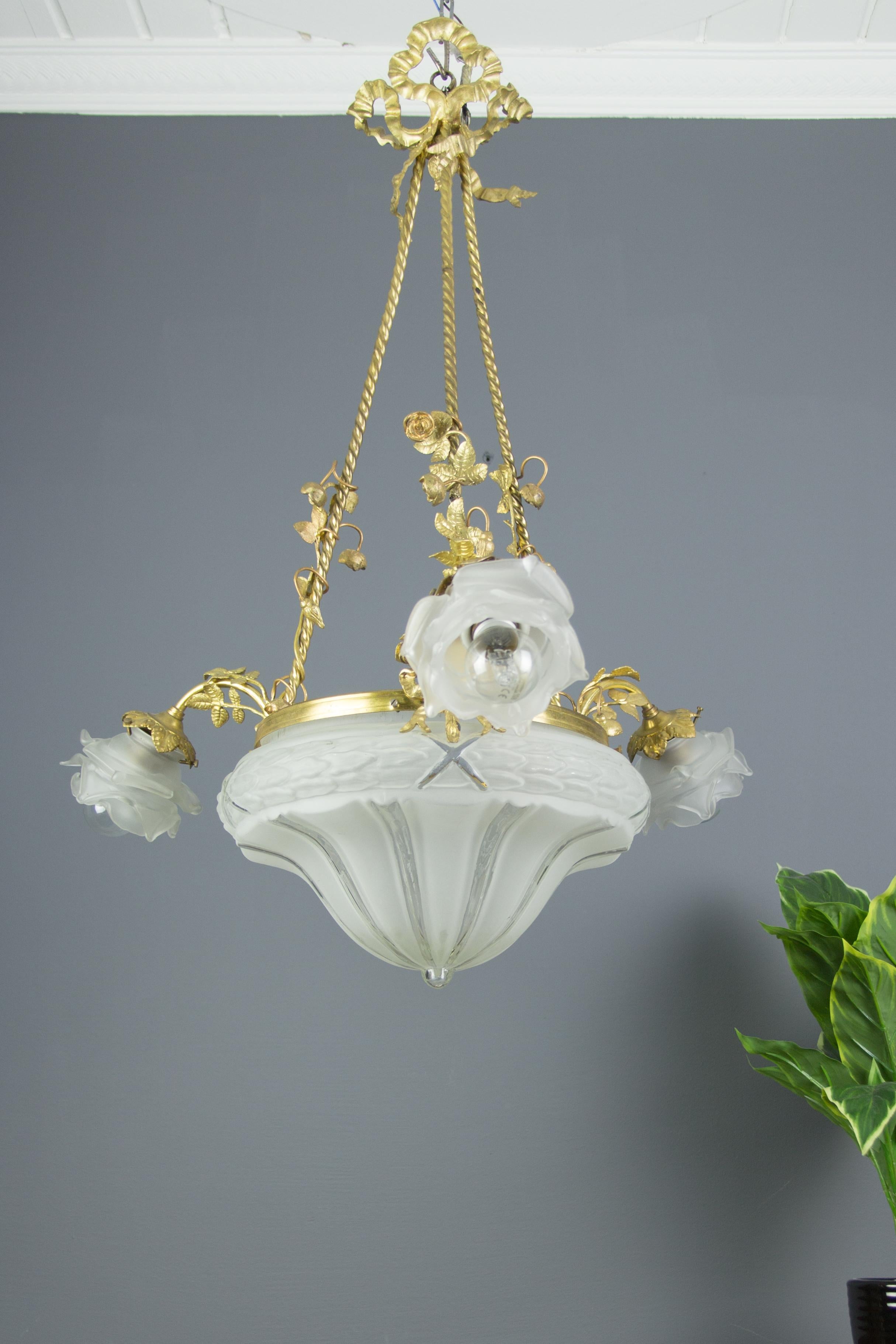 Early 20th Century Louis XVI Style Gilt Bronze and Frosted Glass Chandelier with Bronze Flowers