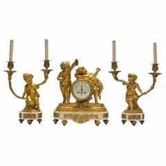 Louis XVI Style Gilt Bronze and Marble Cherub Clock Garniture