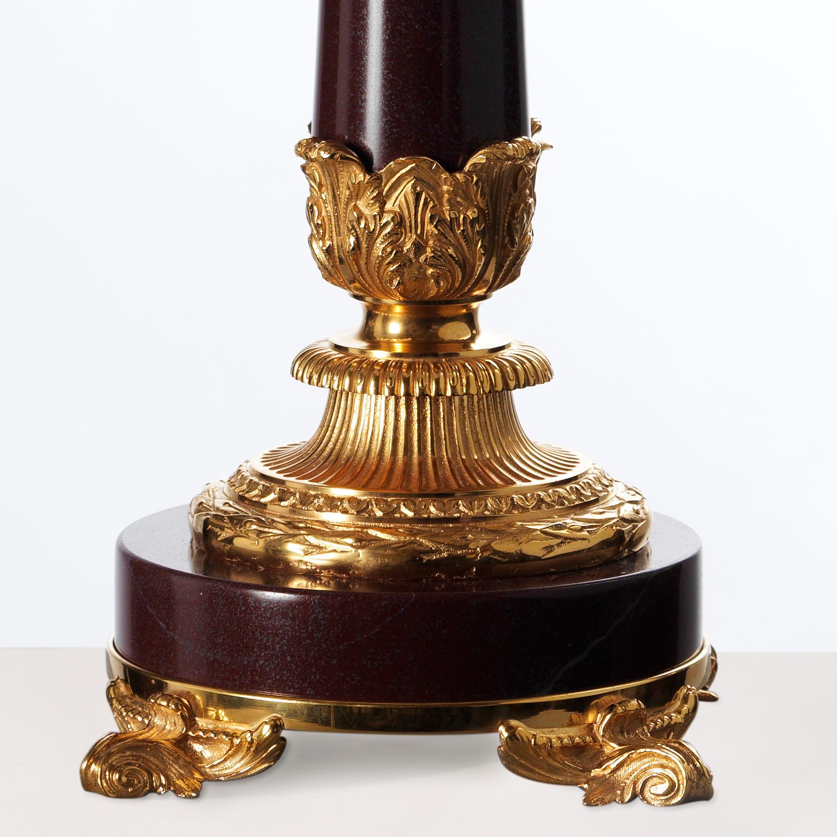 This elegant Louis XVI Style Gilt Bronze and Red Marble Lamp By Gherardo Degli Albizzi features high-quality gilt bronze decoration such as the fully chiseled Corinthian style capital or the base with a blossom motif.
This piece offers a large