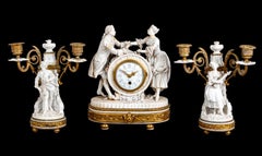 Louis XVI Style Gilt Bronze and Sevres Clock Set