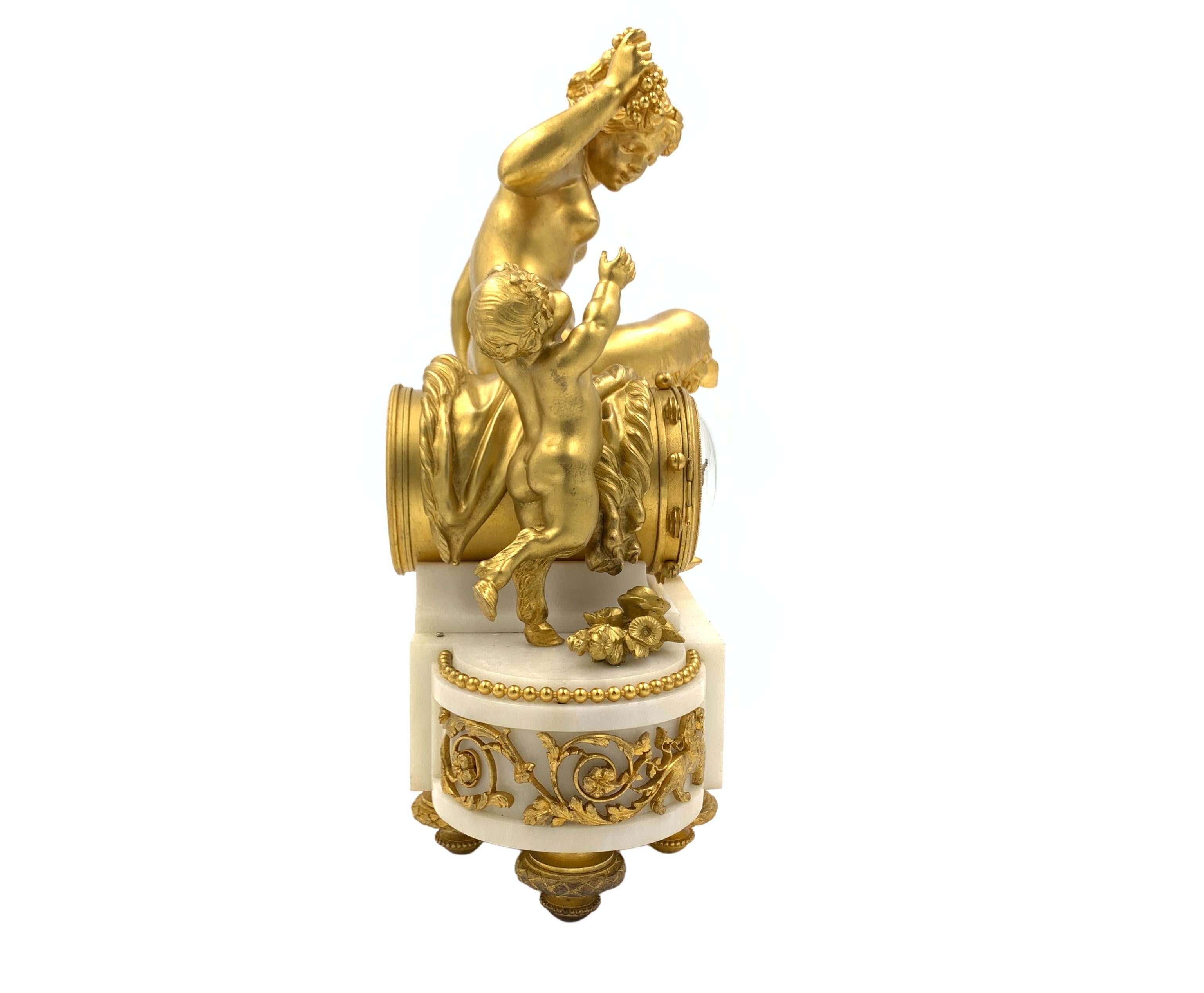 This playful Louis XVI style gilt-bronze and white marble clock, made by François Linke after a Clodion design, late 19th century.