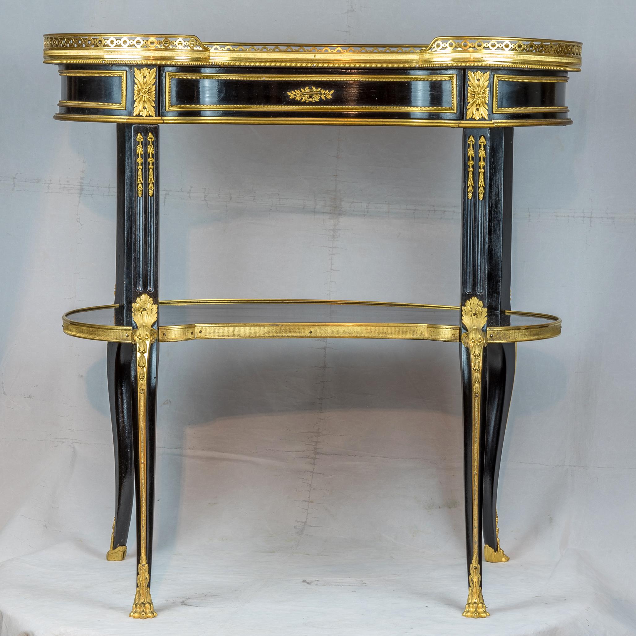 Fine quality Louis XVI style gilt bronze mounted ebonized writing table.
A gorgeous French ormolu-mounted ebonized writing table.

Date: 19th century
Origin: French
Dimension: 28 x 27 x 17 inches.
