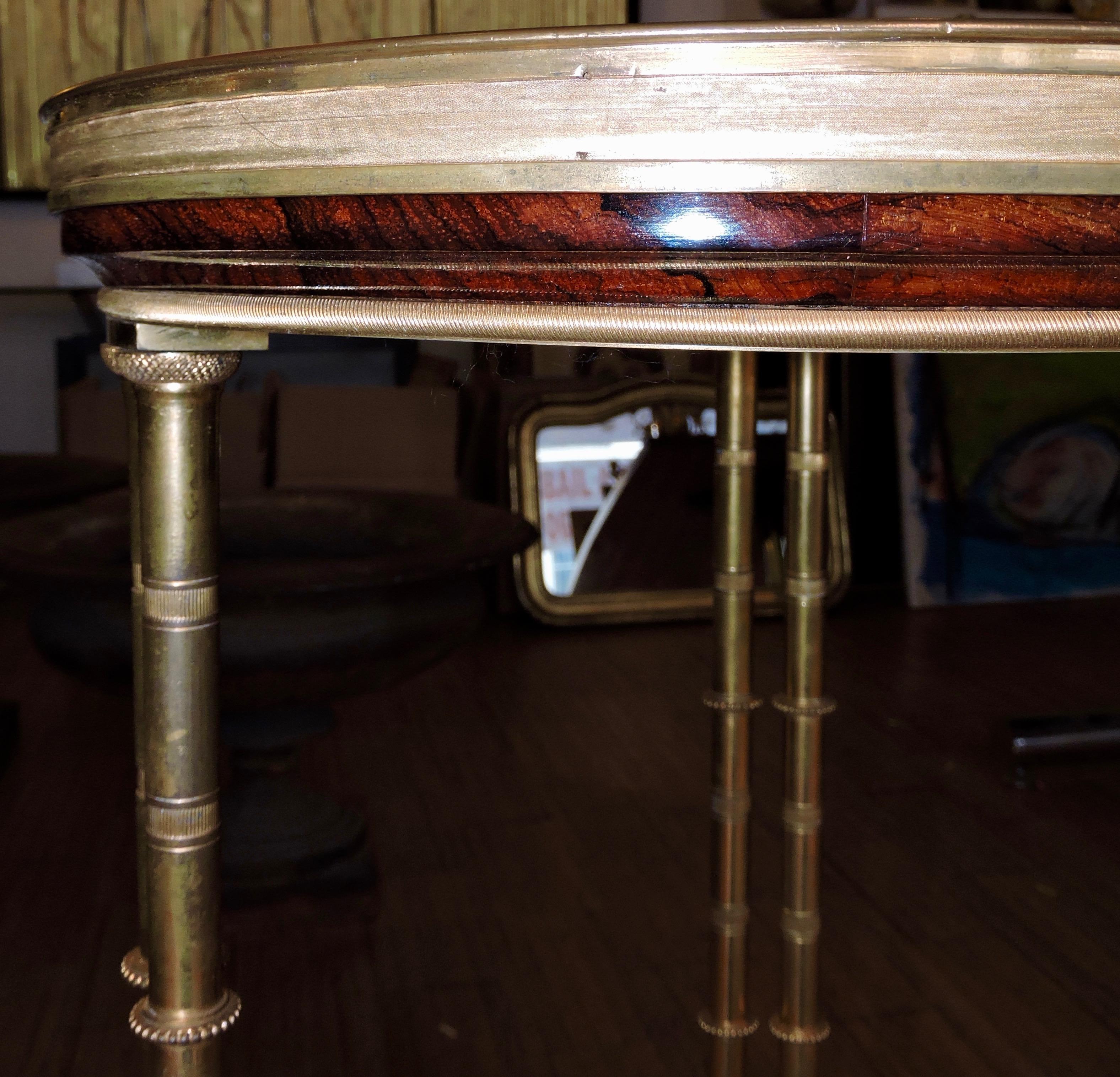 A French marble and ormolu-mounted Louis XVI style guéridon after the model by Adam Weisweiler
With inset Brocatelle d'Espagne marble top on three reeded legs imitating bamboo joined by a shaped undertier.
Original mercury gilding,
circa 1880.