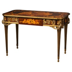 Table centrale de style Louis XVI en marqueterie montée sur bronze doré par Beurdeley