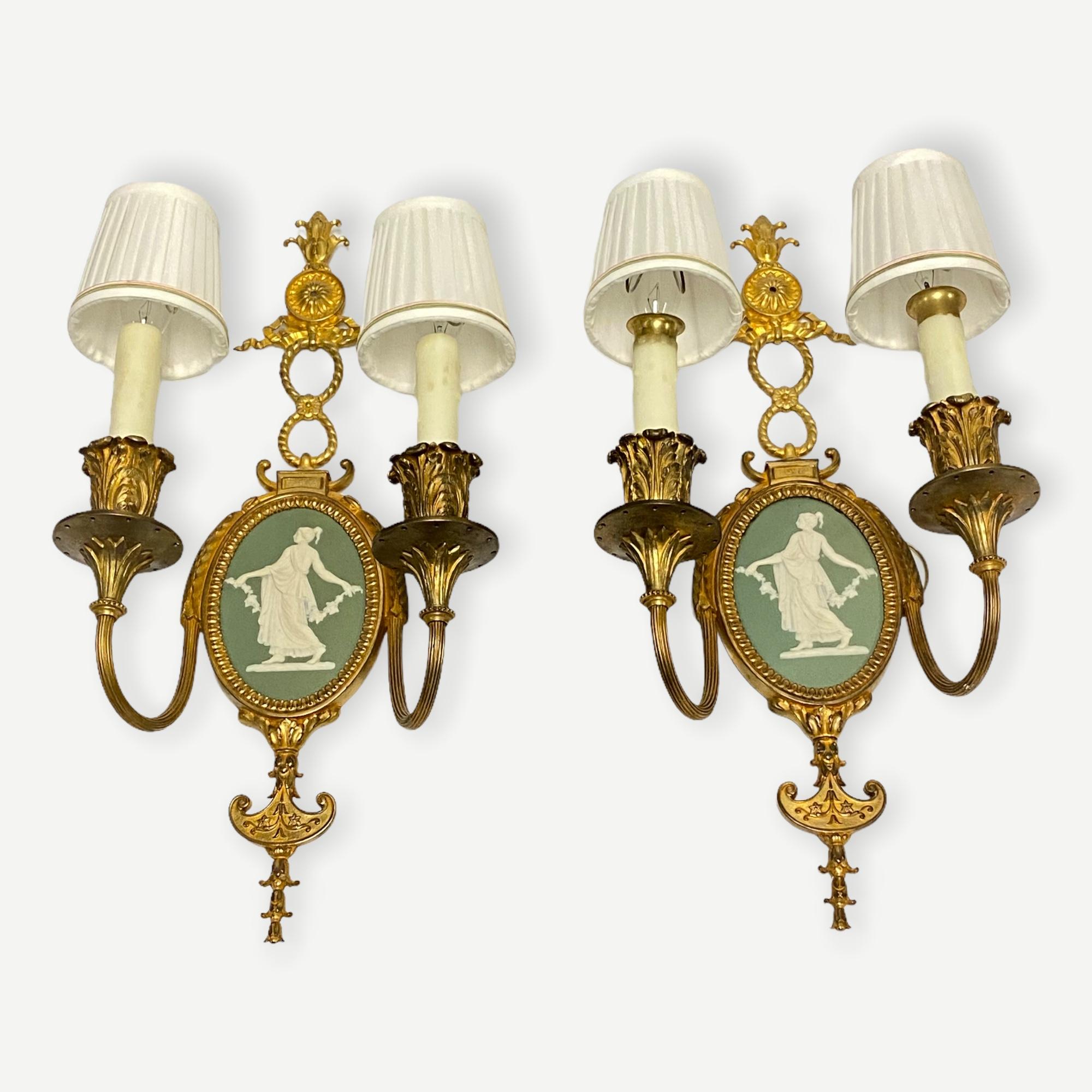 Louis XVI style gilt bronze sconces with neoclassical jasperware plaques by Wedgwood.