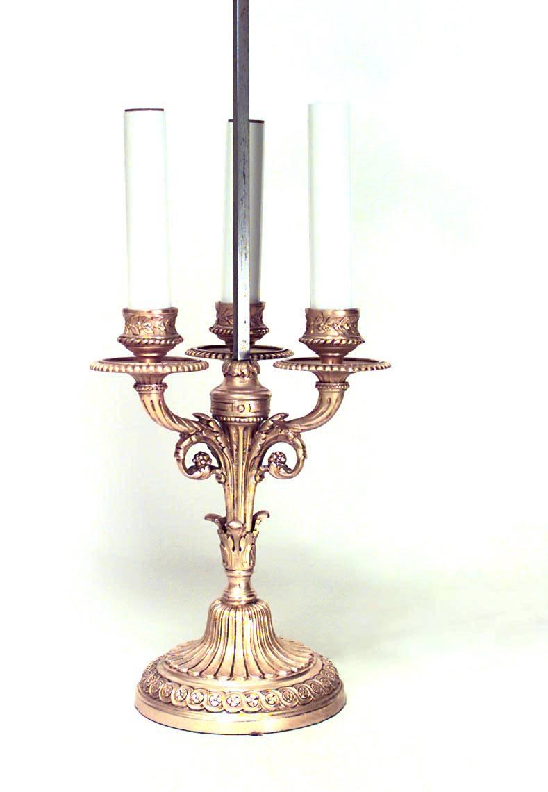French Louis XVI style gilt bronze 3-arm candelabra base bouillotte table lamp with green tole shade.

