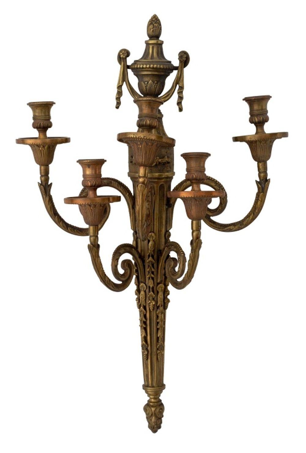 Pair of Louis XVI Style Gilt Bronze Five Branch Appliques, late 19th century, with urn and ribbon finial and grapevine motif to the arms. 22