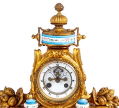 Louis XVI Style Gilt Metal and Sevres Mantel Clock