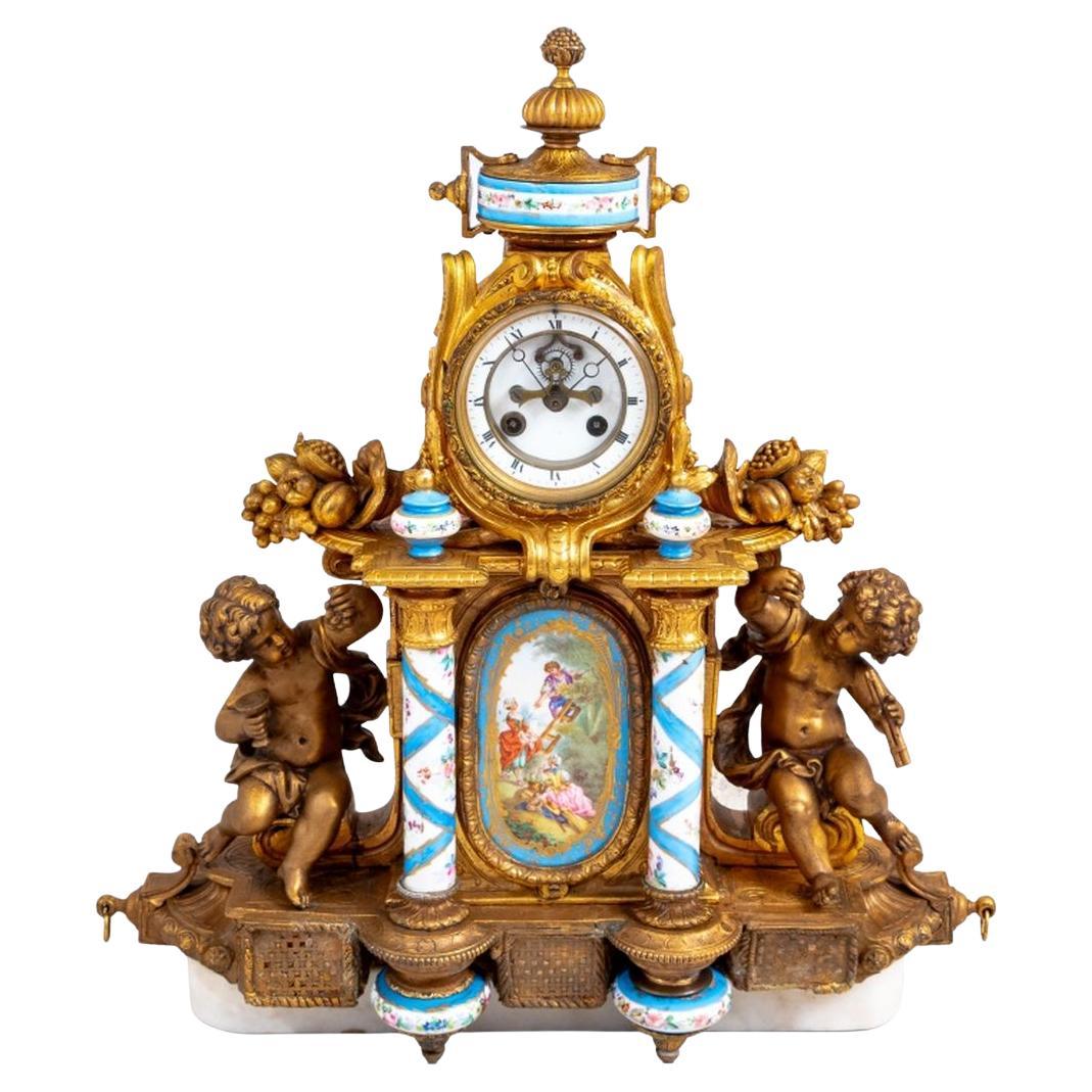 Louis XVI Style Gilt Metal and Sevres Mantel Clock