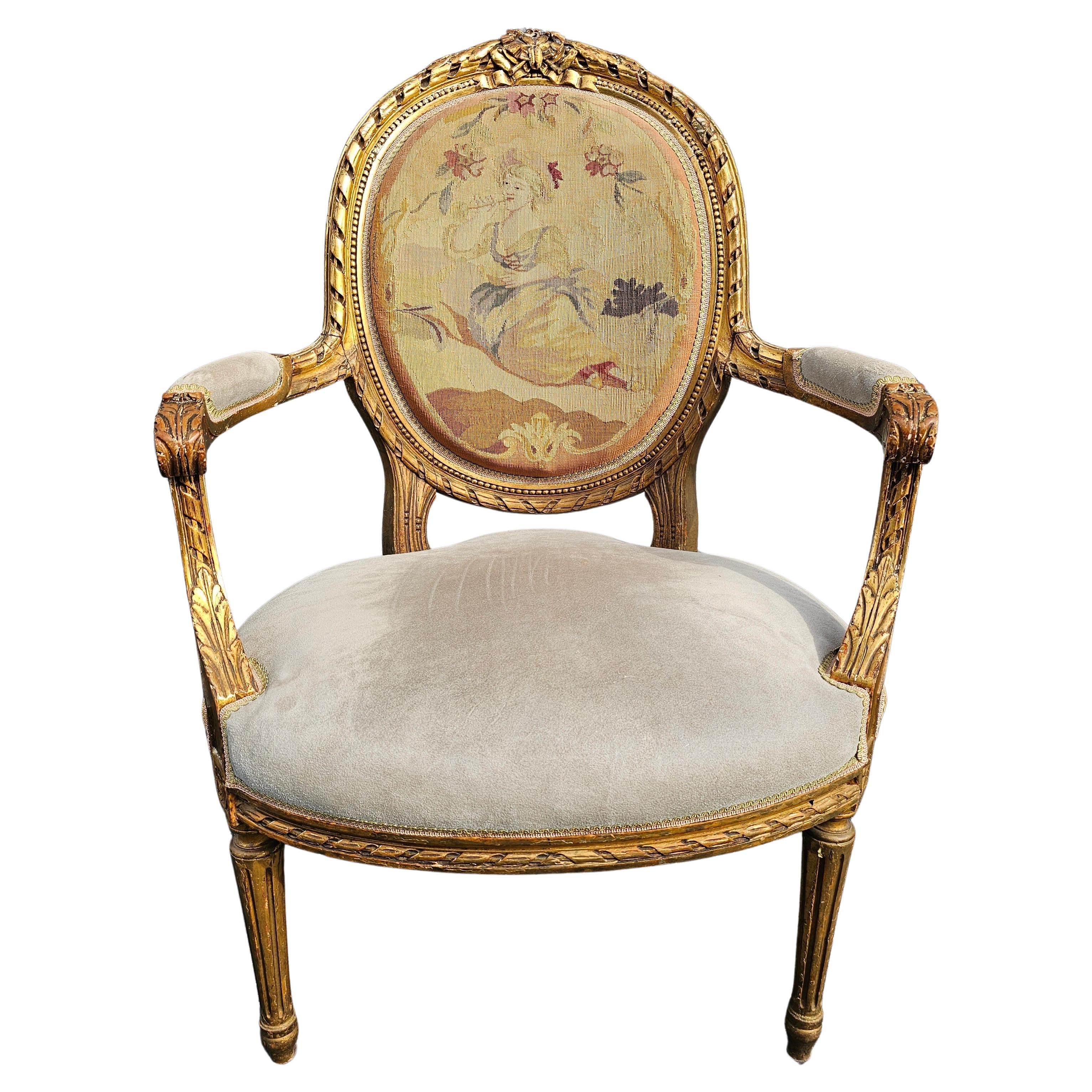 An exquisite giltwood, fine Suede Leather and French needlepoint upholstered bergere chair in very good vintage condition.
Measures 26