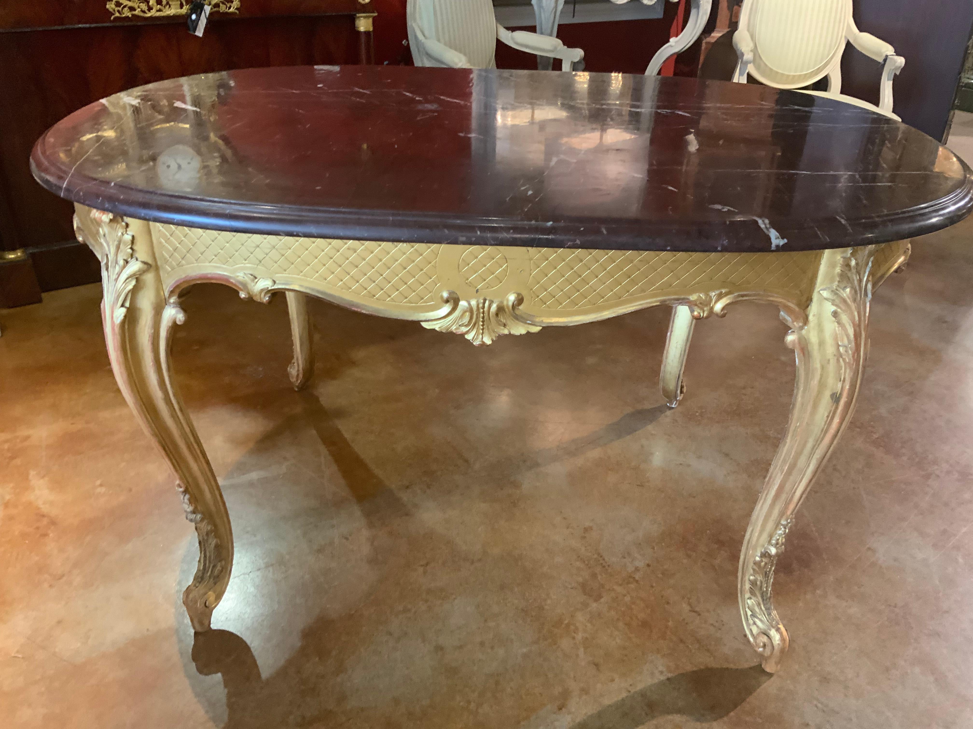 Hand-Carved Louis XVI-style gilt wood and  rouge griotte marble top center table For Sale