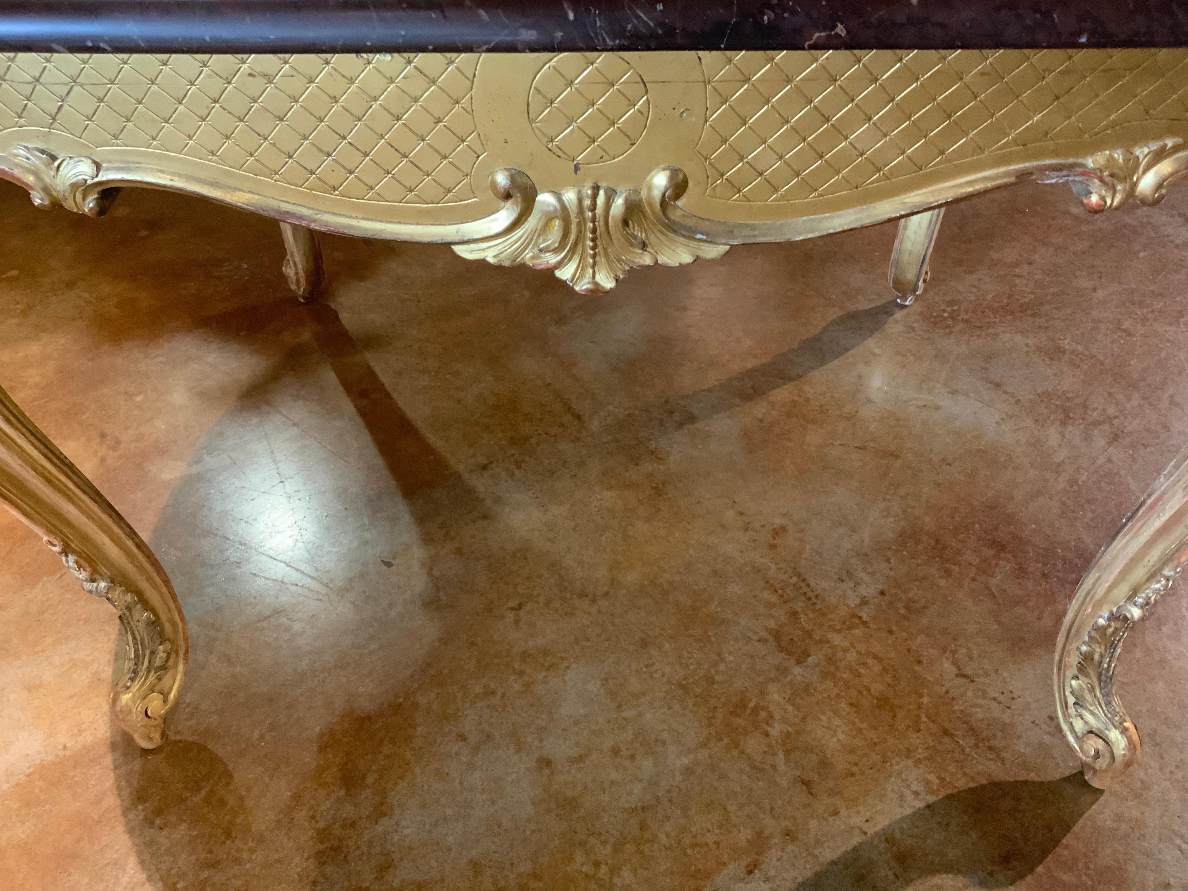 Giltwood Louis XVI-style gilt wood and  rouge griotte marble top center table For Sale