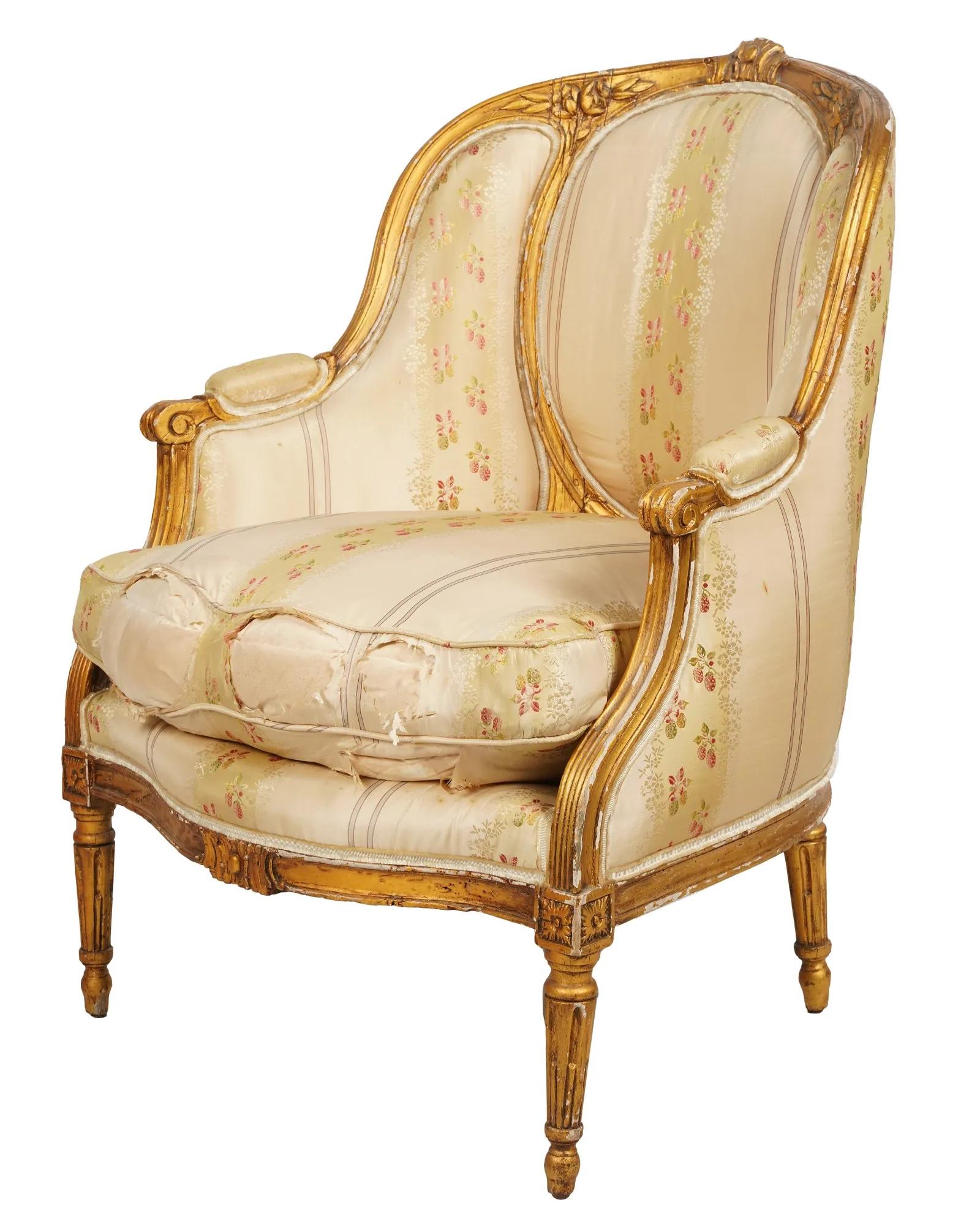 Beautiful Late 19th Century French Louis XVI Style gilt wood settee still retaining remnants of the original gilt gesso finish. Intricate hand carved detailing throughout the frame. Vintage silk damask upholstery has frayed in the front.