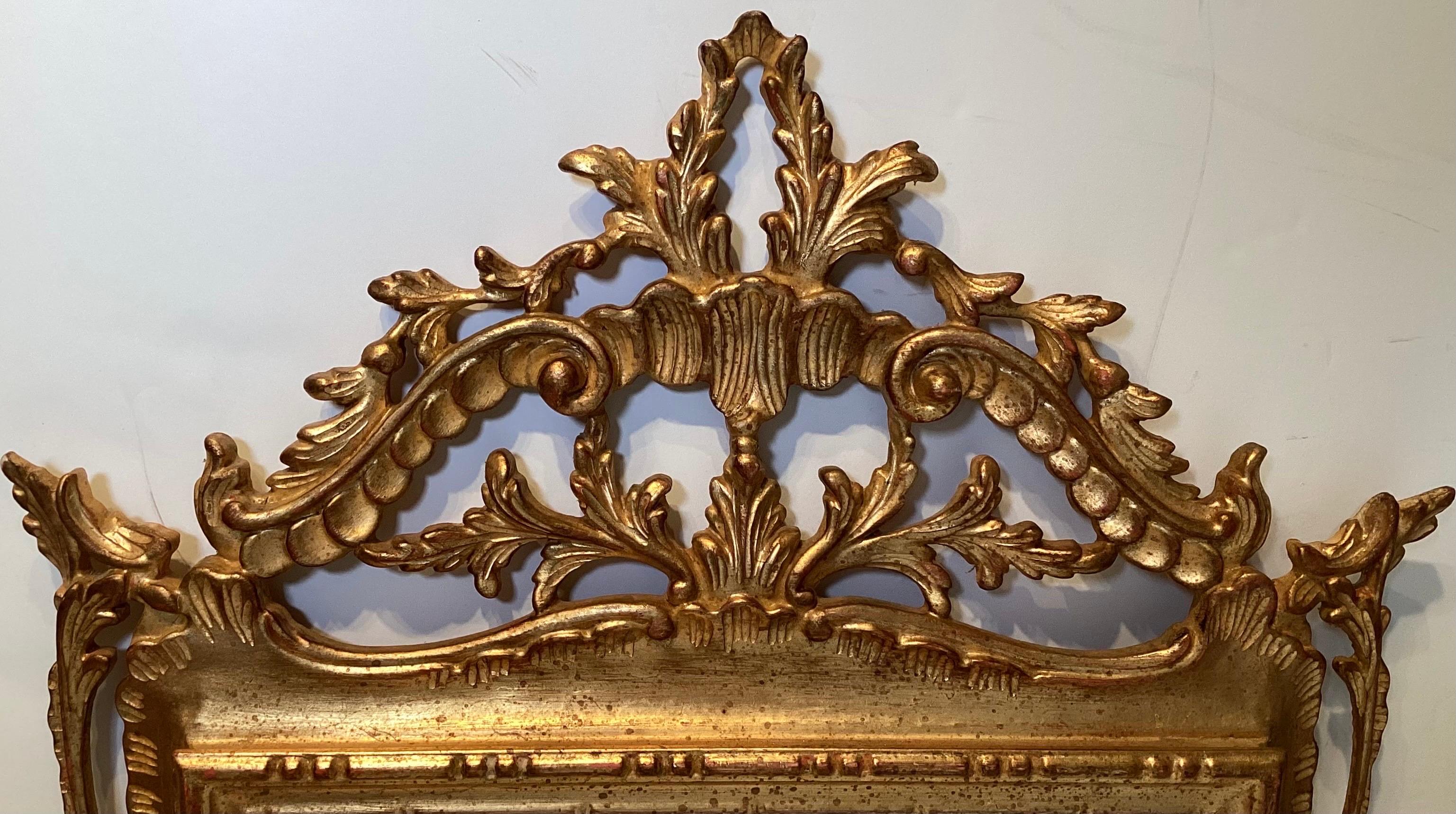 Beautiful carved Louis XVI gilt wood mirror in very good original condition.