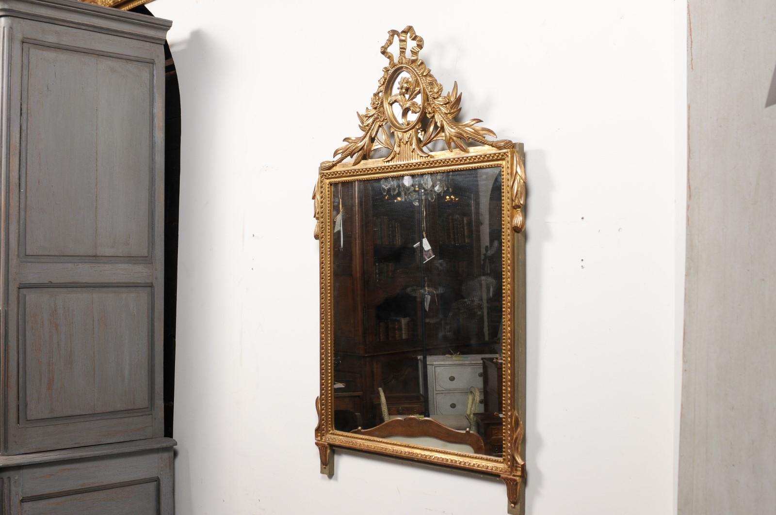 Louis XVI Style Gilt Wood Mirror with Floral Carved Medallion Crest and Tassels For Sale 8
