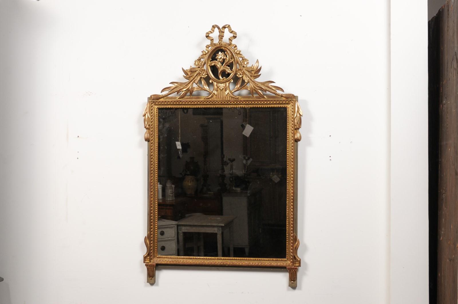 Louis XVI Style Gilt Wood Mirror with Floral Carved Medallion Crest and Tassels For Sale 1