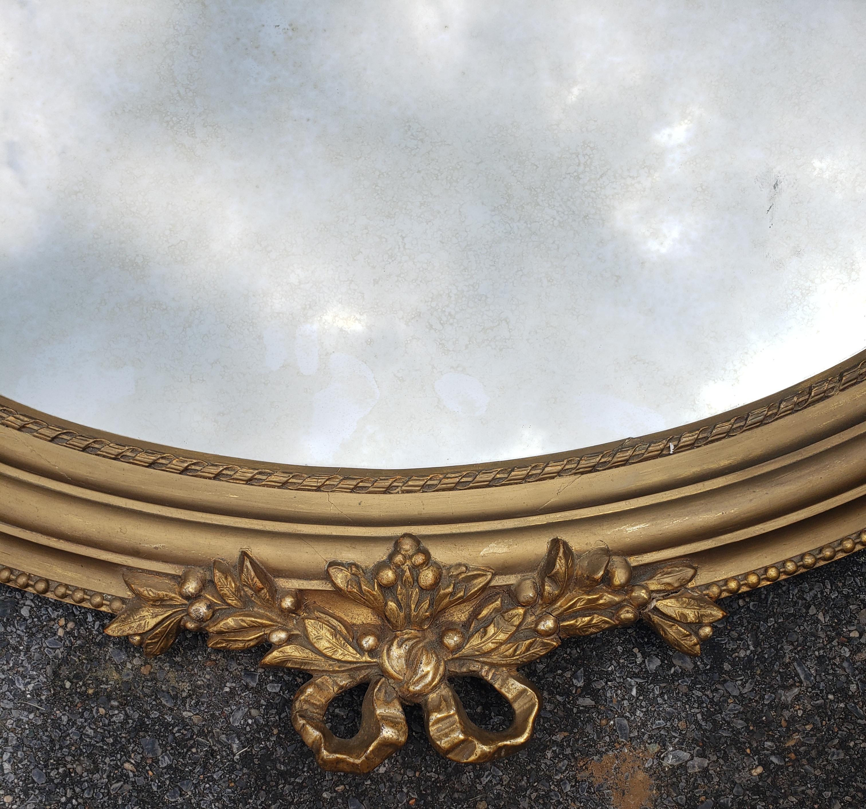American Louis XVI Style Giltwood Decorated Oval Wall Mirror For Sale