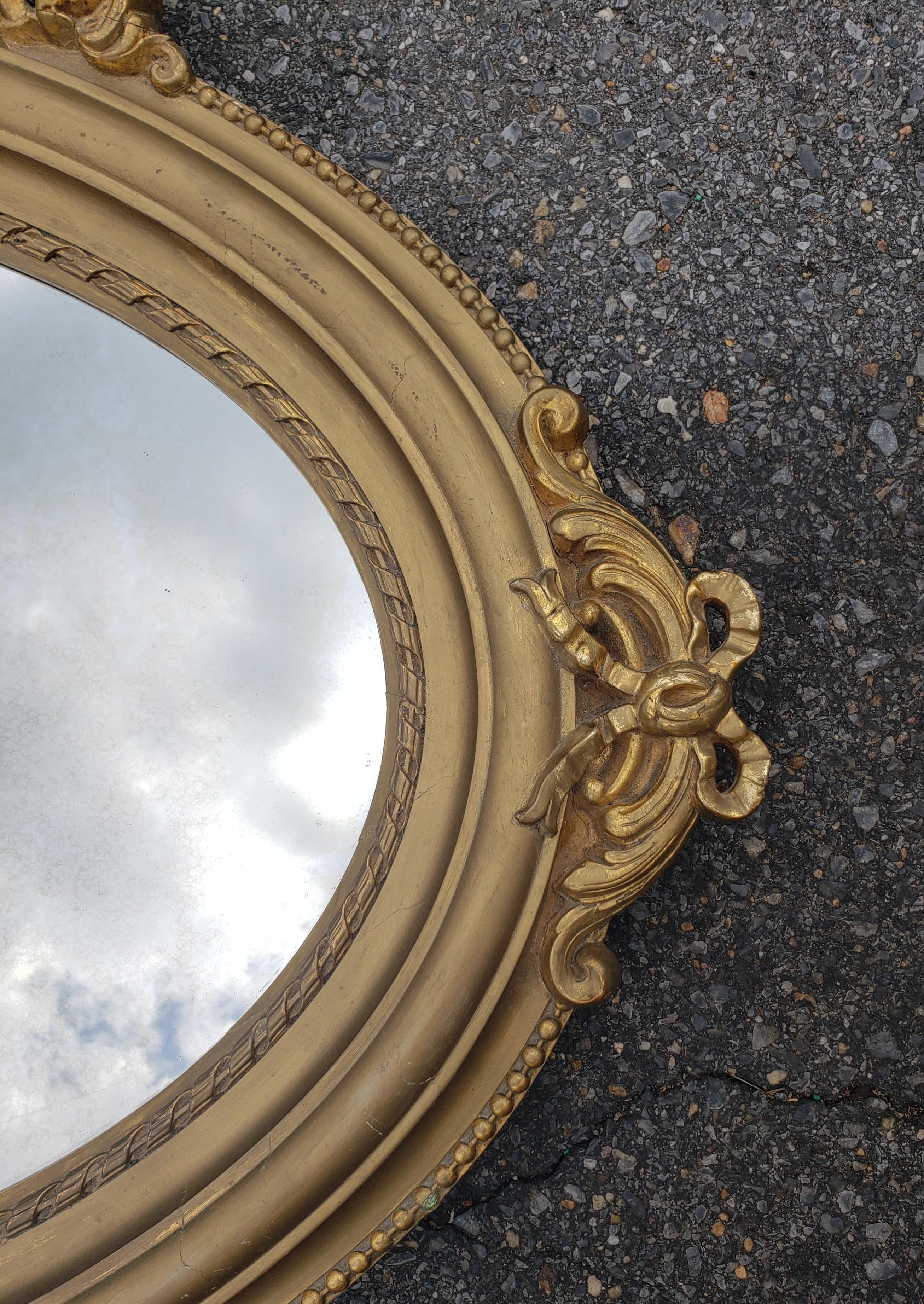 Louis XVI Style Giltwood Decorated Oval Wall Mirror In Good Condition For Sale In Germantown, MD