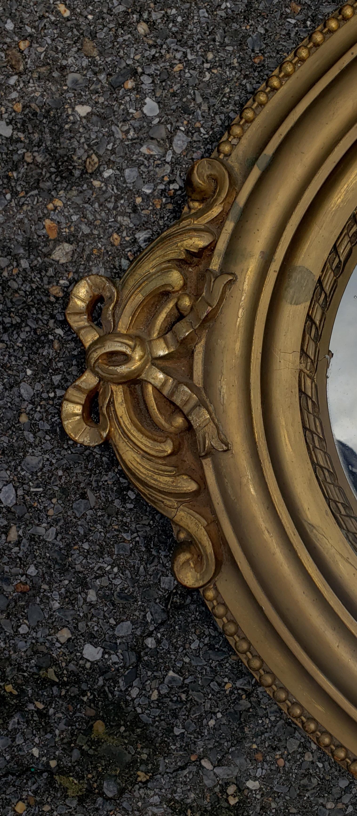 20th Century Louis XVI Style Giltwood Decorated Oval Wall Mirror For Sale