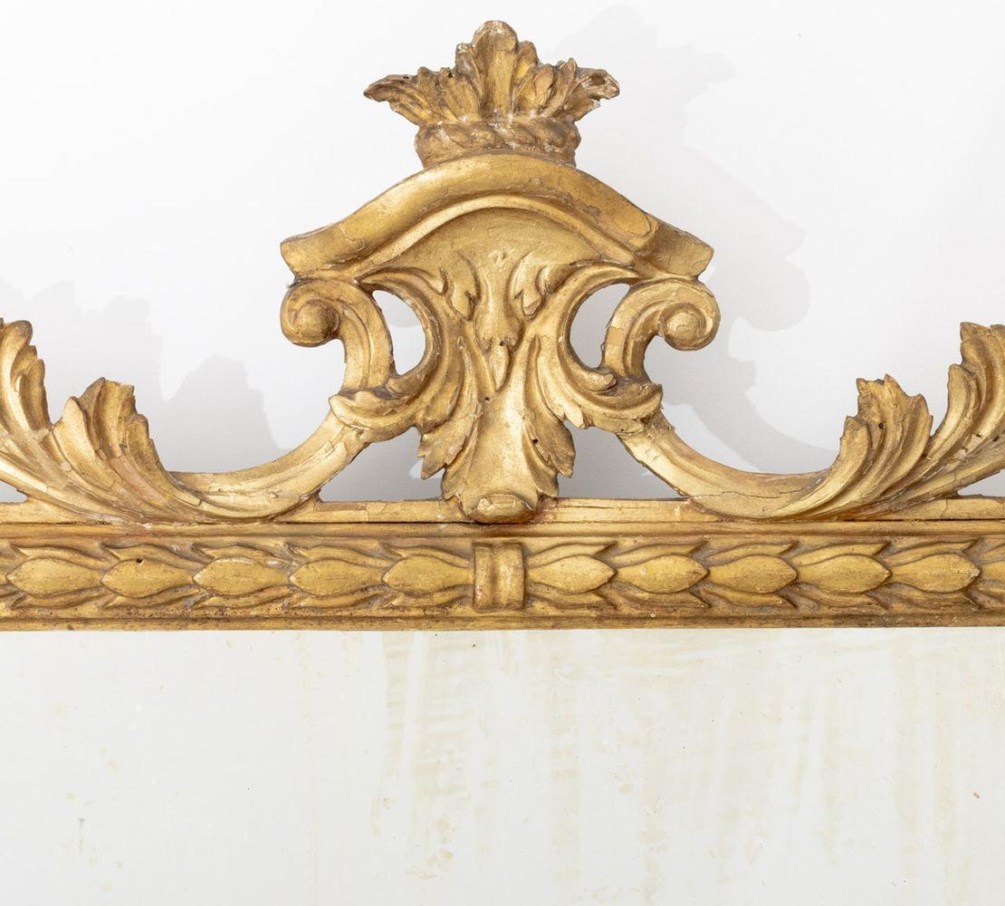 Français Miroir en bois doré de style Louis XVI, A.I.C. en vente