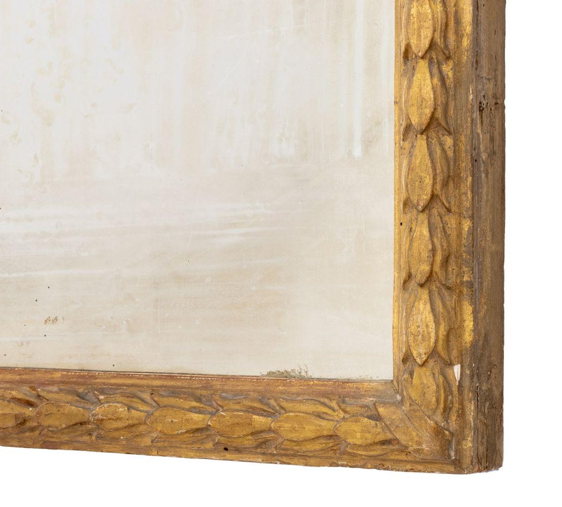 Miroir en bois doré de style Louis XVI, A.I.C. en vente 1