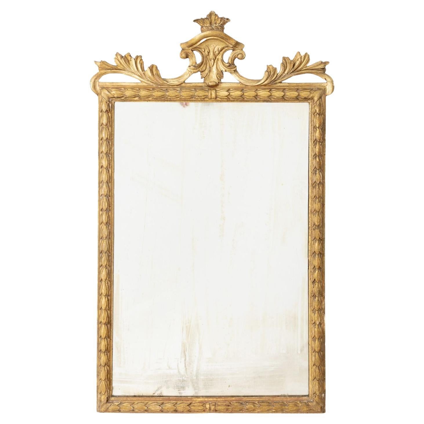Miroir en bois doré de style Louis XVI, A.I.C. en vente