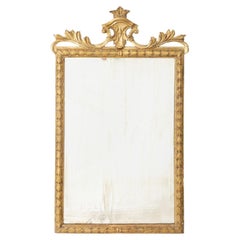 Miroir en bois doré de style Louis XVI, A.I.C.