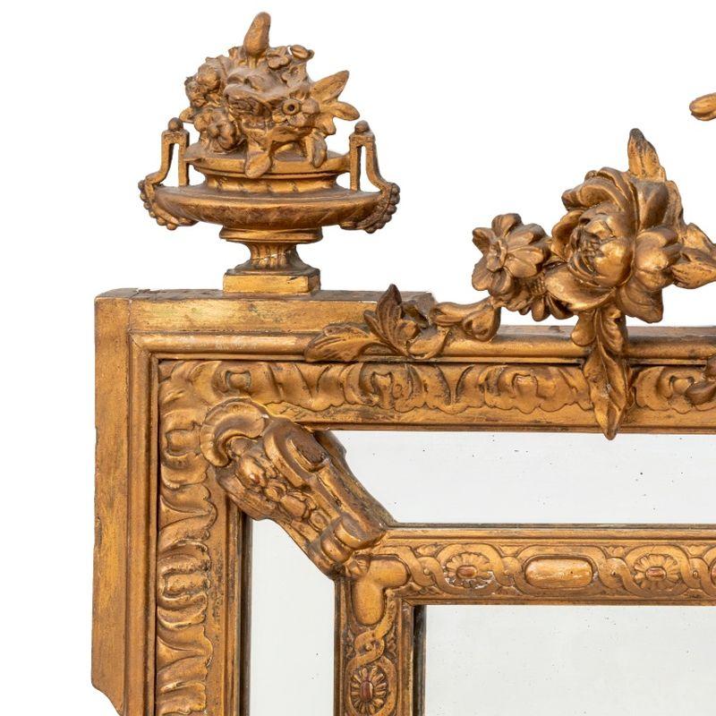 Louis XVI Style Giltwood Mirror, with floral bouquet crest and urn motif. 60 