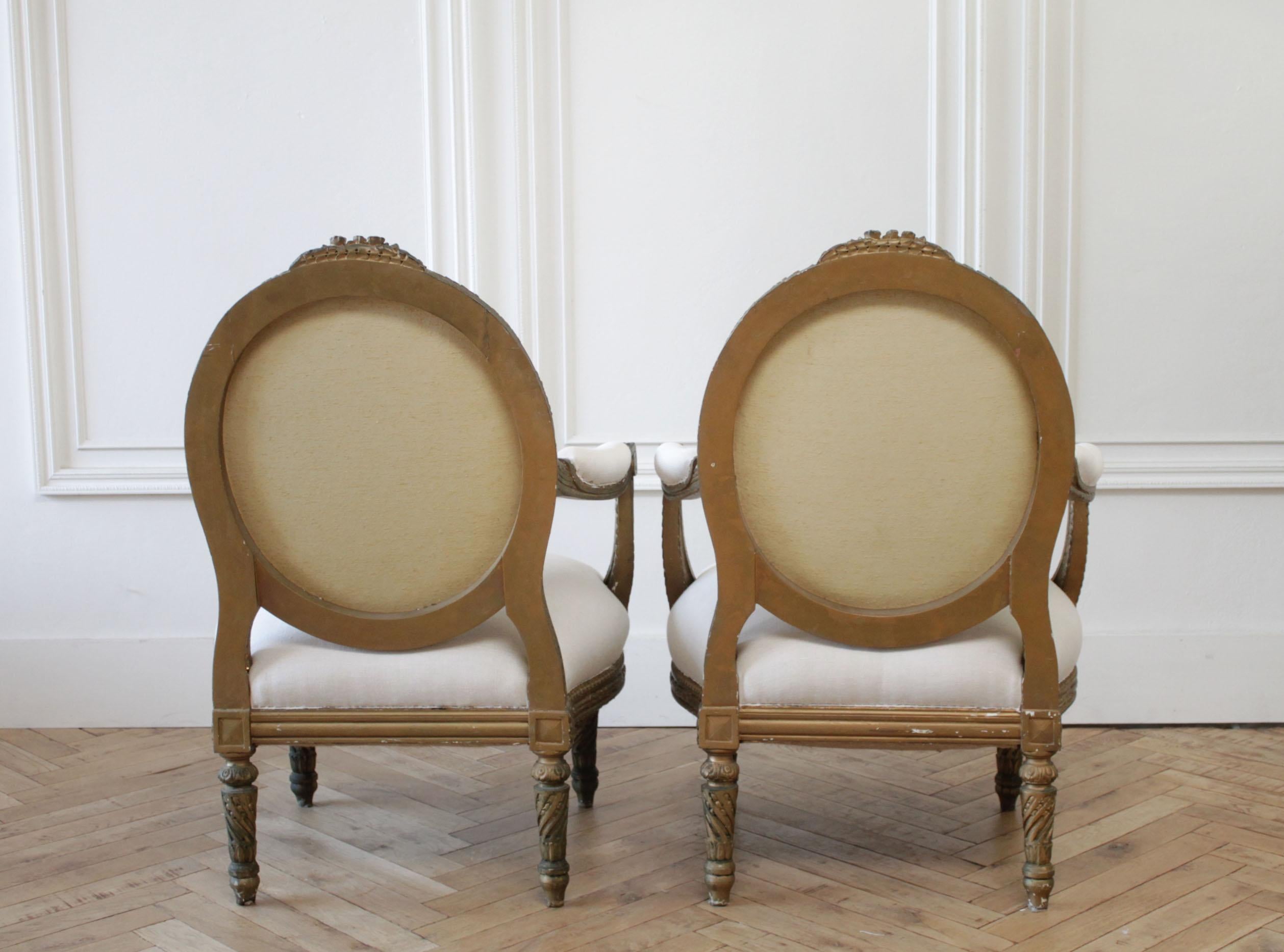 20th Century Louis XVI Style Giltwood Open Armchairs For Sale