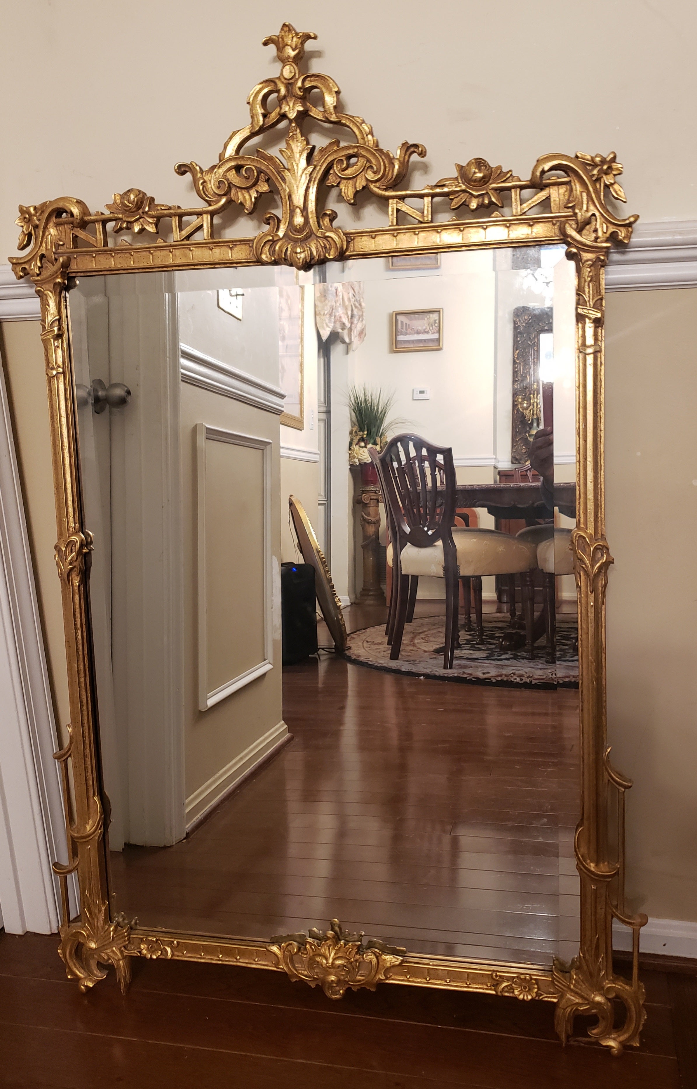 Louis XVI style gold gilt wood frame wall mirror, 
Circa 1960s by the famous Friedman Brothers,  Decorative Arts Inc. of Florida
Beveled glass mirror

W 3 LCLST.