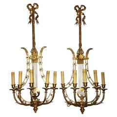 Paire d'appliques murales en bronze à dos de harpe de style Louis XVI