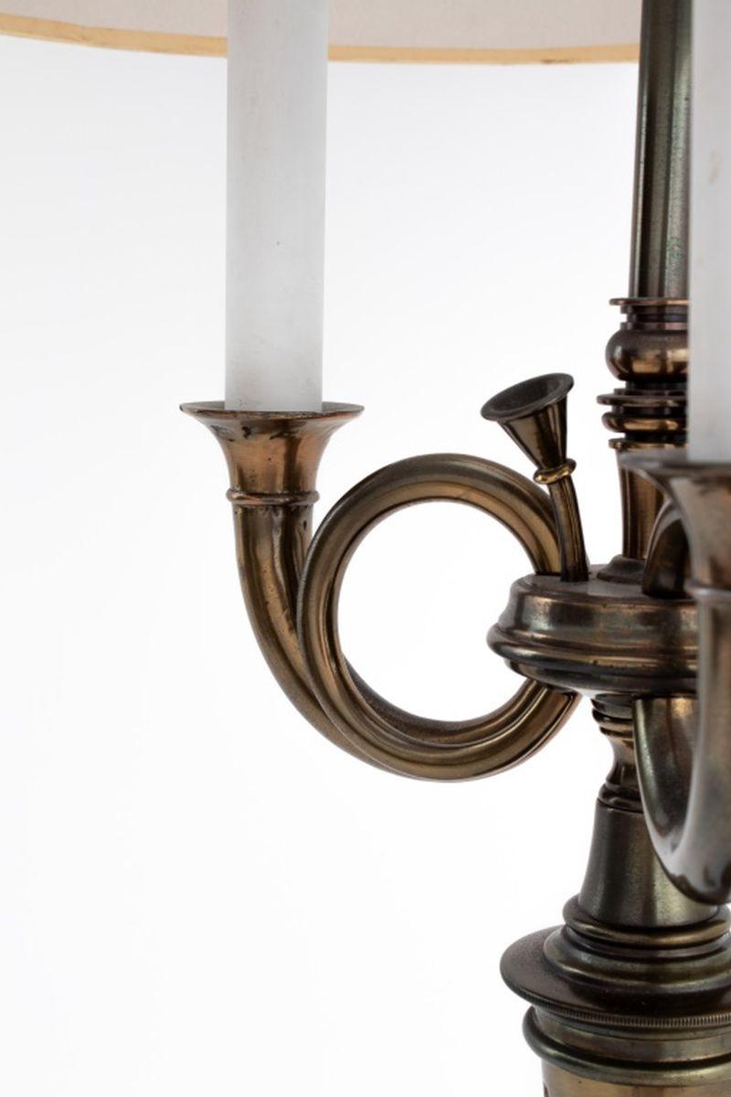 Louis XVI Style Hunting Horn Motif Patinated Brass Bouillotte Lamp, with hunting horn motif, three candlestick form lights, and black painted fabric shade. 35.25